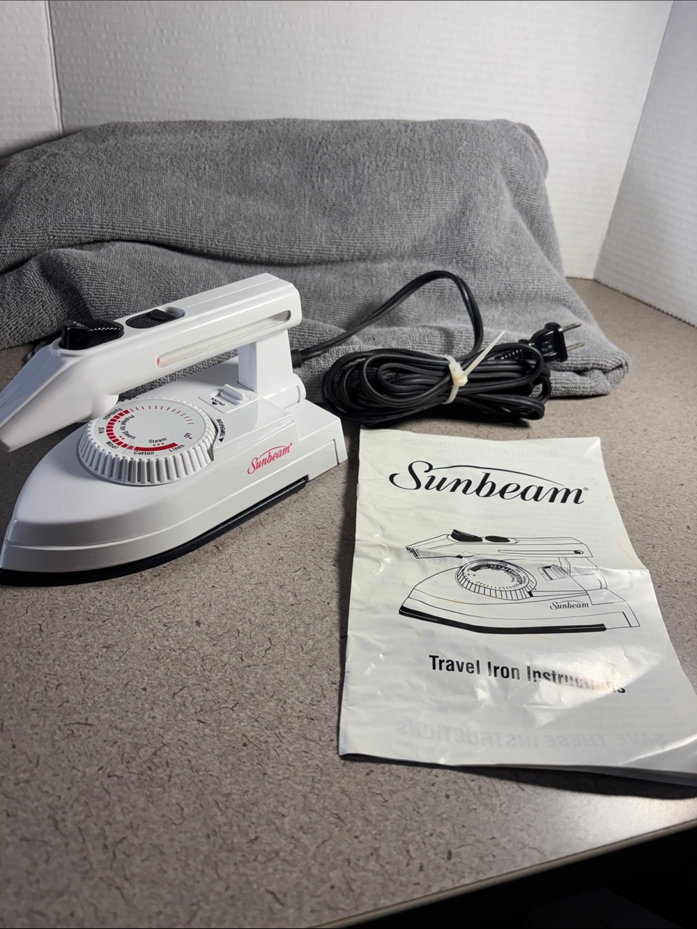 Sunbeam White and Black Travel Iron with Fold-Down Handle